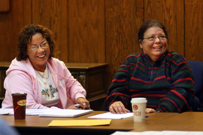 Future students Anita Metallic (left) and Valerie Jacobs share a lighter moment during the School of Social Work's orientation session.
